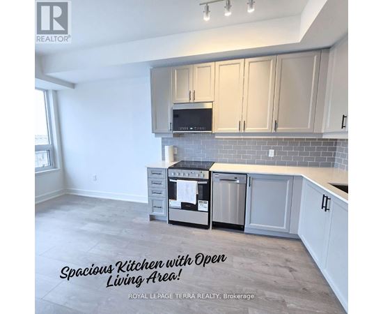 A spacious kitchen with open living area.