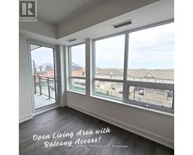 A realtor image of a room with a balcony.