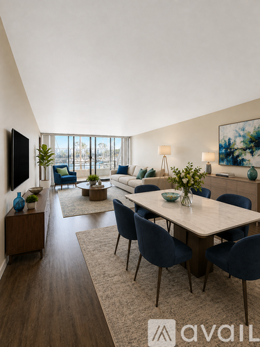 A modern dining room with a large table and chairs.