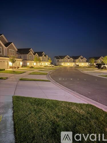 A row of houses with the Avail logo in the foreground.