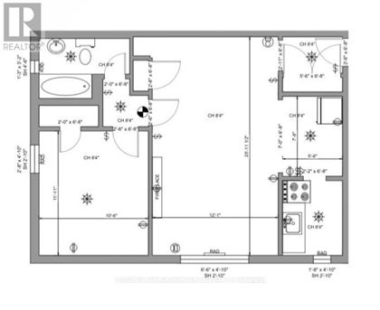 A floor plan of a house with a kitchen, living room, and bathrooms.