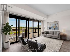 A living room with a large window and a view of the outdoors.