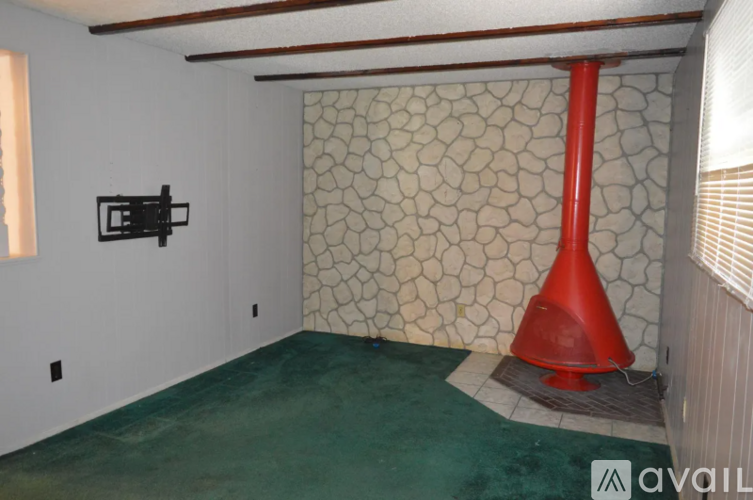 A room with a red object in it.