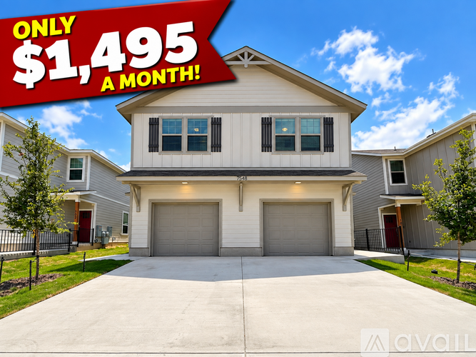 A house with a red banner advertising a monthly payment of $1,495.