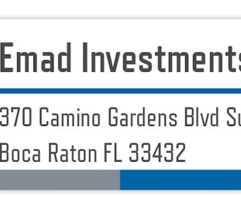 A sign with the name Emad Investments and an address in Boca Raton, Florida.