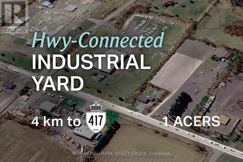 An aerial view of a property with the text "Hwy-Connected INDUSTRIAL YARD" and "4 km to 417" on it.