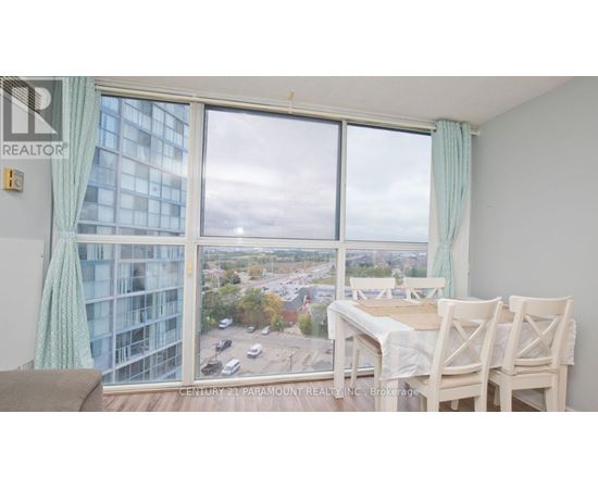 A dining room with a view of the city.