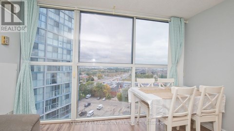 A dining room with a view of the city.