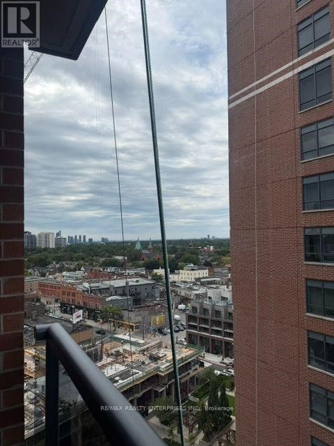 A view from a high-rise building looking down at a construction site.