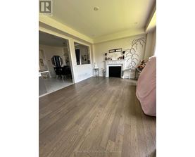A living room with a fireplace and a piano.