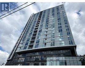 A tall building with a sign that reads "Homelife Landmark Realty Inc Brokerage".
