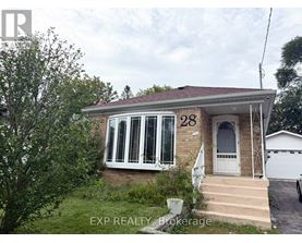 A house with the number 28 on it is for sale.