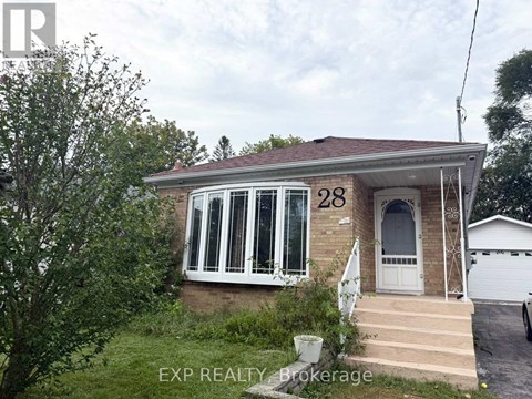 A house with the number 28 on it is for sale.
