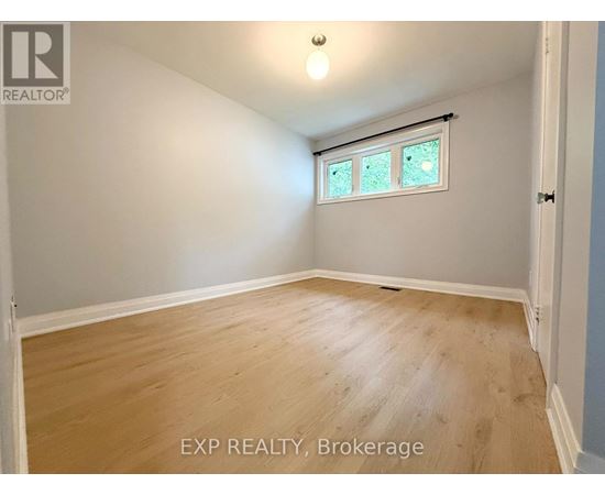 A room with EXP REALTY, Brokerage watermark on the floor.