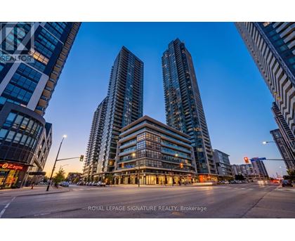 A city street with tall buildings and a sign that reads "Royal LePage Signature Realty, Brokerage".