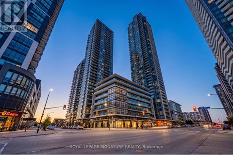 A city street with tall buildings and a sign that reads "Royal LePage Signature Realty, Brokerage".