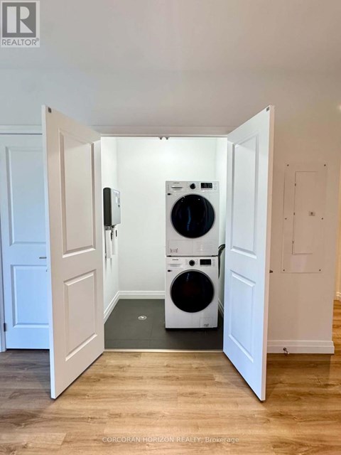 A laundry room with a washer and dryer in it.