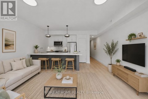 A modern living room with a sofa, coffee table, and a television.