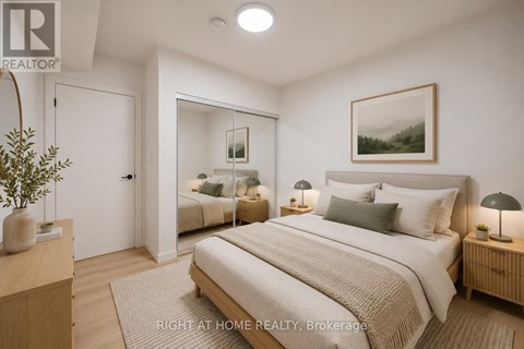 A bedroom with a large bed and a mirror on the wall.