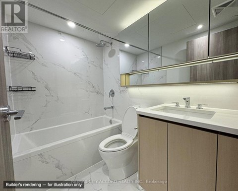 A bathroom with a marble wall and a toilet.