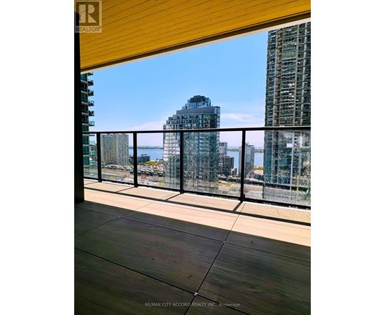 A balcony with a view of the cityscape.