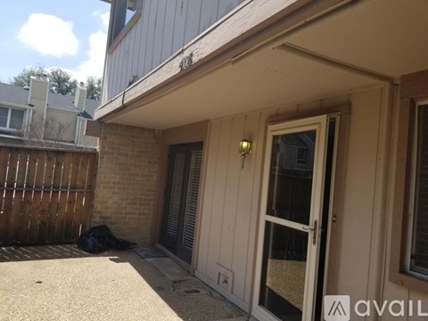 A house with a door and a window is for sale.