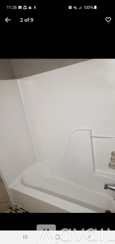 A white bathtub is shown in the image.