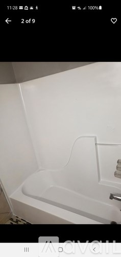 A white bathtub is shown in the image.