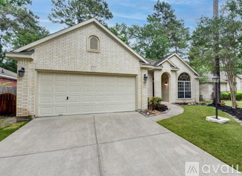 A house with a white garage door is for sale.