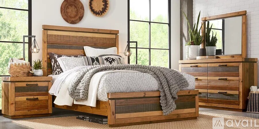 A bedroom with a large bed, wooden furniture, and a mirror.