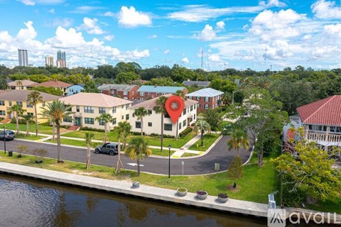 A view of a residential area with a river running through it.