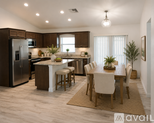 A modern kitchen with a dining table set for four.