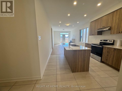 A kitchen with a countertop and cabinets is shown in this image.