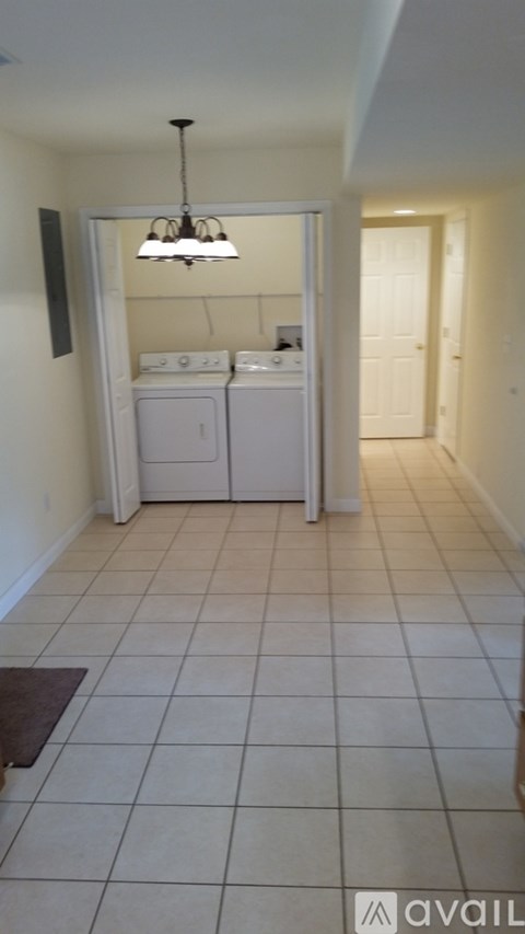 A laundry room with a washer and dryer.