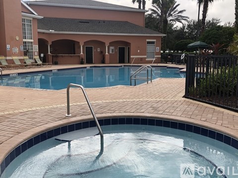 A pool with a ladder in the middle of it.