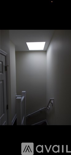 A bathroom with a toilet and a sink.