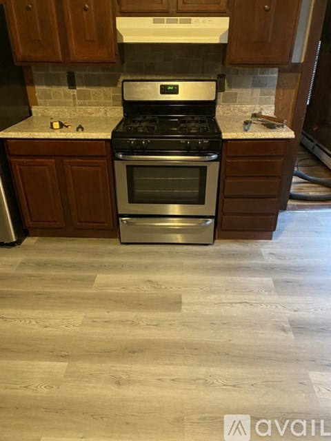 A kitchen with a stove and oven.