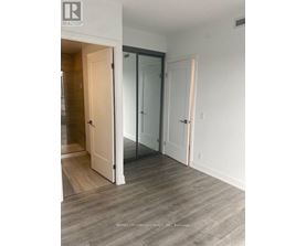 A room with a white door and a glass door.