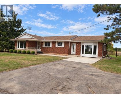 A house with a driveway in front of it.