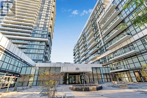 The image shows a modern building with the number 251 on it.