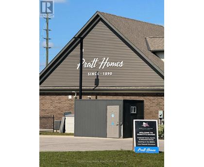 A sign in front of a building that says "Craft Homes" and "Since 1890".