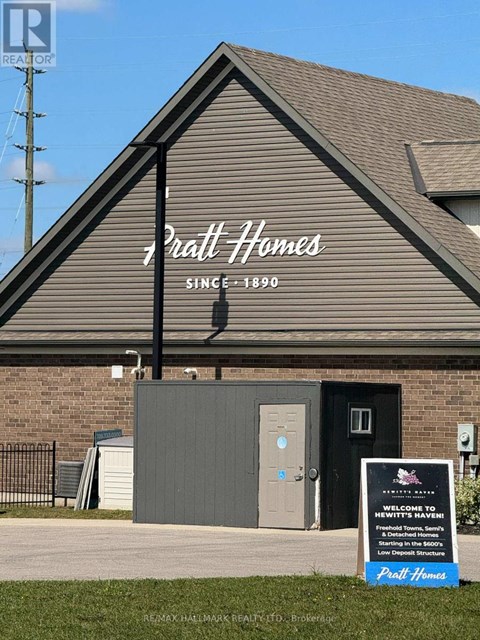 A sign in front of a building that says "Craft Homes" and "Since 1890".