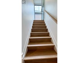 A set of stairs leading to a door.