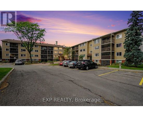 A parking lot in front of a building with the text EXP REALTY, Brokerage.