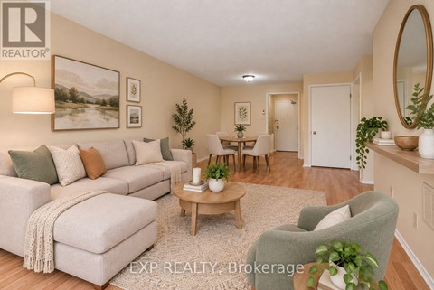 A well-lit living room with a couch, chair, and coffee table.