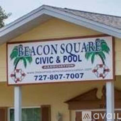 A sign for Beacon Square Civic and Pool is displayed.