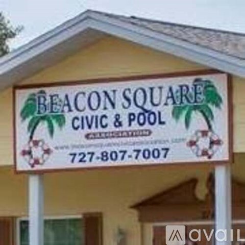 A sign for Beacon Square Civic and Pool is displayed.