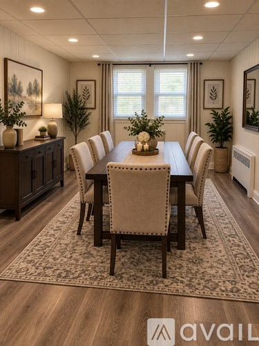 A dining room with a wooden table and chairs.