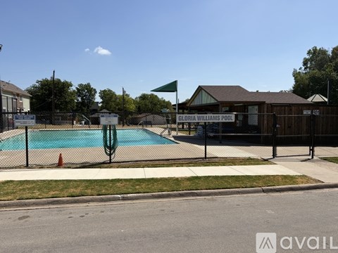 A pool with a sign that says Gloria Williams Pool.