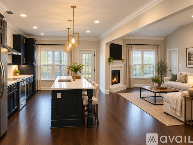 A modern kitchen with dark wood floors and a large island in the center.